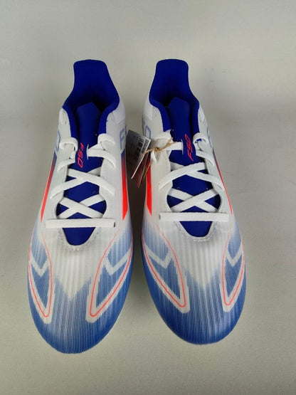 Pair of blue and white Adidas F50 Club FxG shoes on a gray background - Front view @runinrain