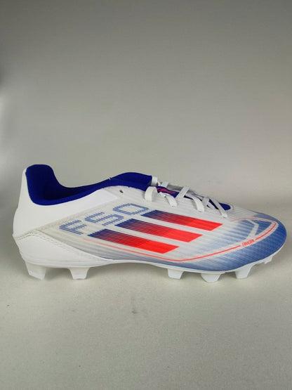 White Adidas F50 Club FxG cleat with blue and red accents on a gray background - Side view @runinrain