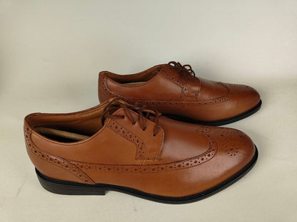 Clarks Beckfield Limit Men's Tan Leather Wingtip Brogue on a light gray background – Side View hero shot @RunInRain