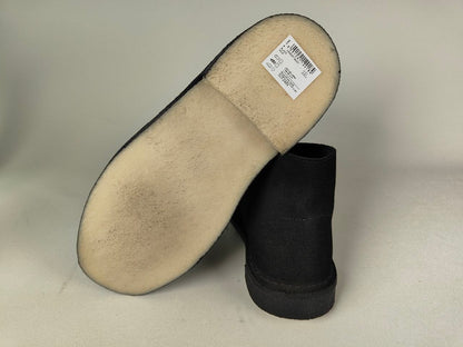 Black Clarks Originals Desert Boot with beige insole on a neutral background