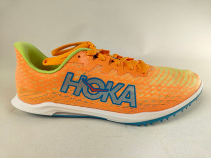 Orange HOKA Cielo X 2 MD track spikes with blue Hoka branding on a light gray background – Side View