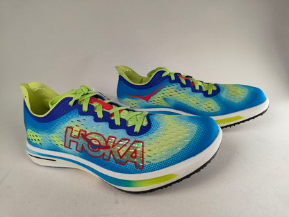 A pair of Hoka Cielo FlyX Carbon-Plated Track Spikes Cyan/Lime shoes with 'Hoka' branding on a gray background – Side View @RunInRain