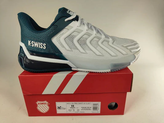 K-Swiss Ultrashot 4 men's clay court tennis shoe in white and dark blue, durable grip outsole for clay surfaces - detail view @RunInRain