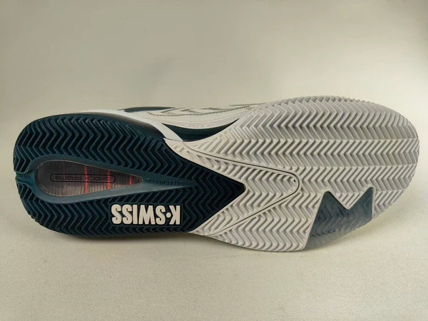 Close-up of a K-Swiss Ultrashot 4 Clay Men's Tennis Shoe sole with 'K-Swiss' branding on a neutral background – Sole View @RunInRain