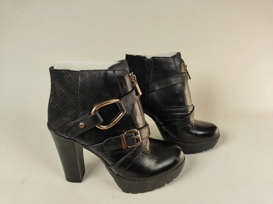 La Strada Elite High-Heel Platform Ankle Boots in black leather with gold buckle and zipper detail - side view hero @Runinrain
