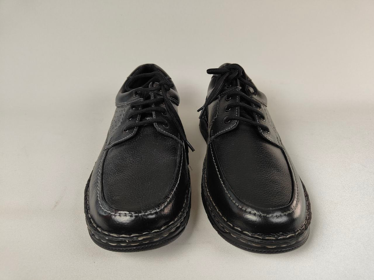 Pair of black Orchard_ Anatomical Leather Loafers on a white background