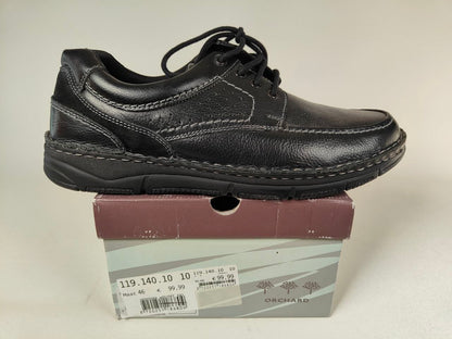 Black Orchard Anatomical Leather Loafers on a cardboard box with 'Orchard' branding.
