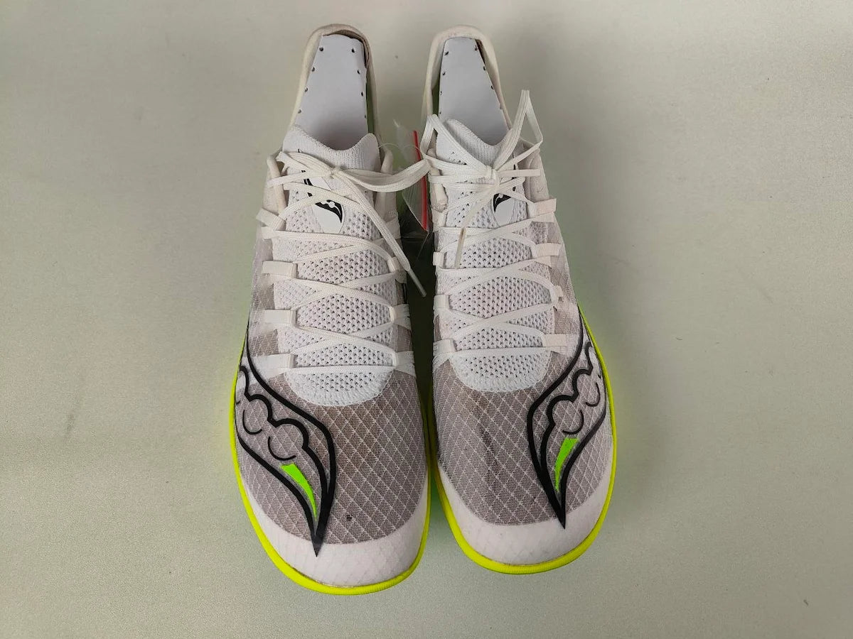 White Saucony Terminal VT with gray and green accents on a light gray background