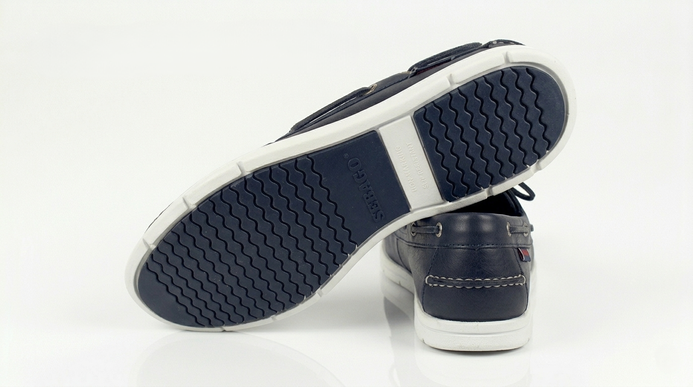 Navy Sebago Docksides Portland Women's Nautical Loafers with white soles on a white background @runinrain