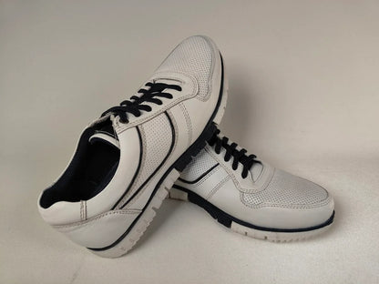 White Cafe moda Urban Chic Sneaker with black accents on a light gray background - 3q view @runinrain
