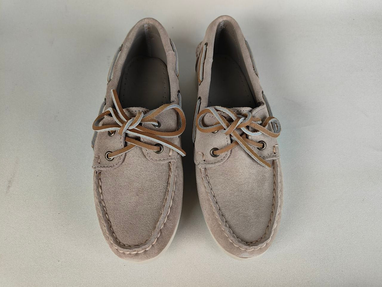 Pair of Sebago Jacqueline Suede Women's brown Boat Shoe on a light gray background – top View @RunInRain