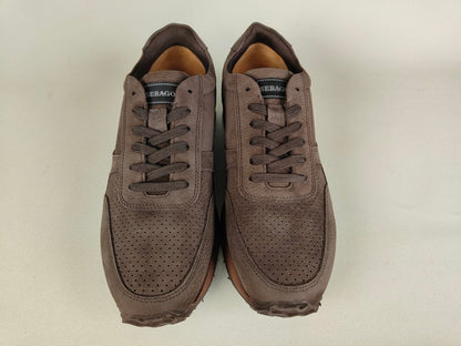 Pair of Sebago Jude NBK Dark Brown shoes on a light beige background