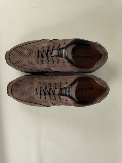 Pair of Sebago Jude NBK Dark Brown Sneakers on a light beige background