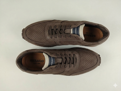 Pair of Sebago Jude NBK Dark Brown on a light beige background